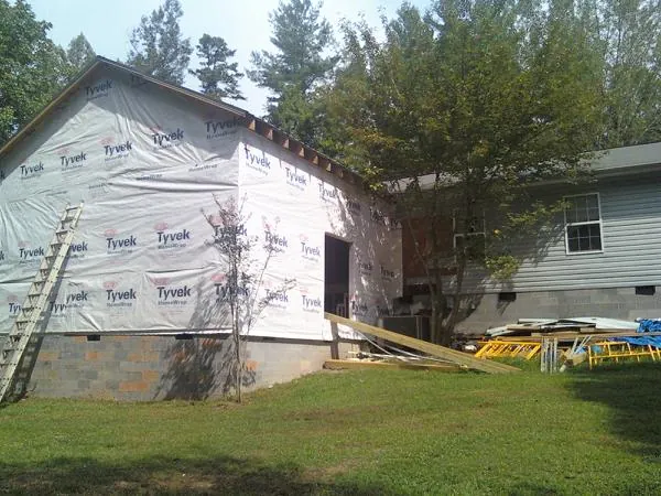 Tyvek wrapped gable on a new room addition beside an existing home in Cressona